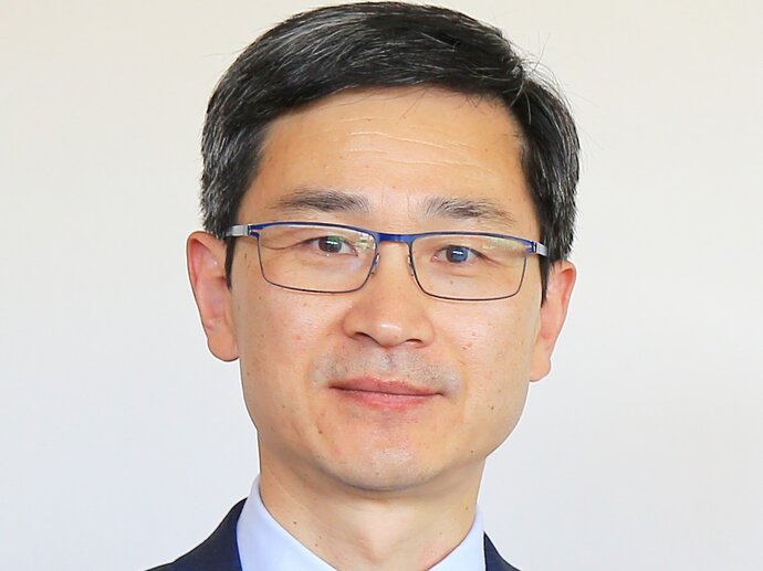 Yaobi Zhang, Chair of NNN
