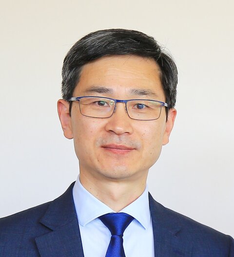 Yaobi Zhang, Chair, NNN